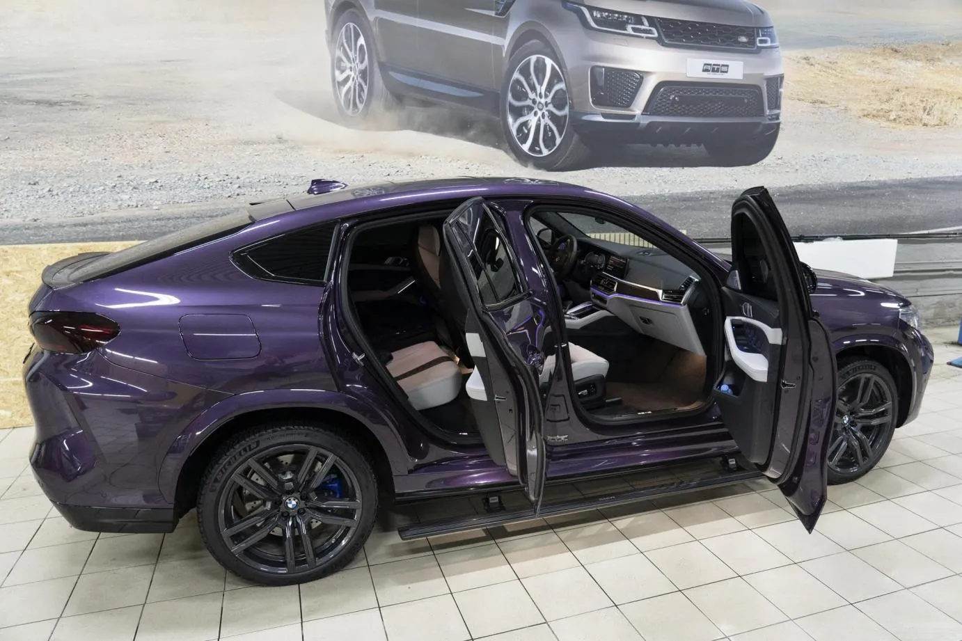 Электрические выдвижные пороги ATS на BMW X6M